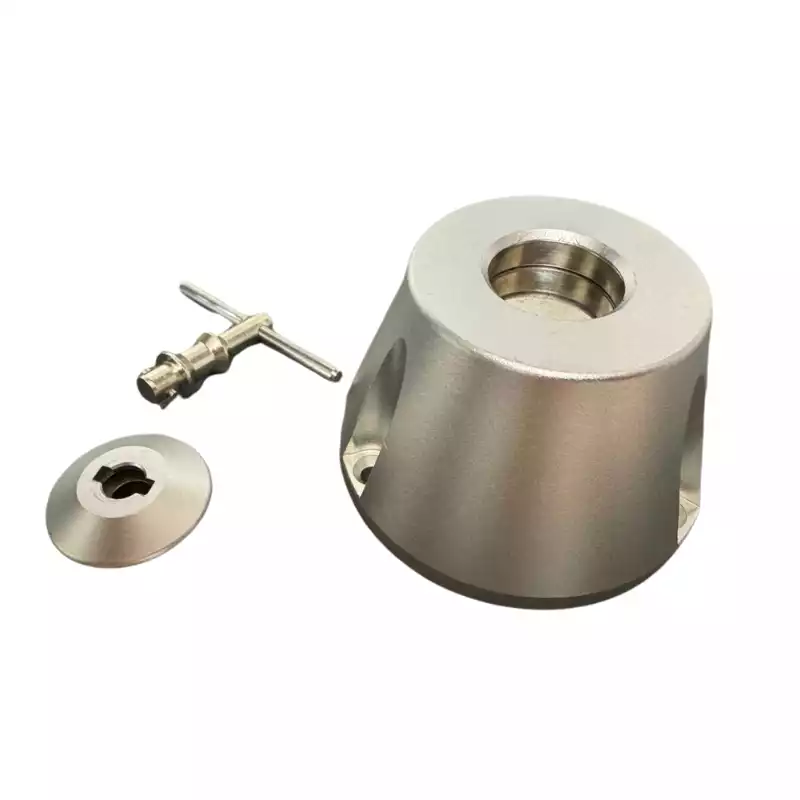Base magnétique pour pohcettes anti-ondes et sa clé de sécurité.